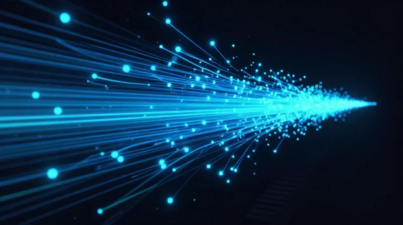 Abstract visualization of nanosecond latency showing fast-moving fiber optic light trails in a digital space.