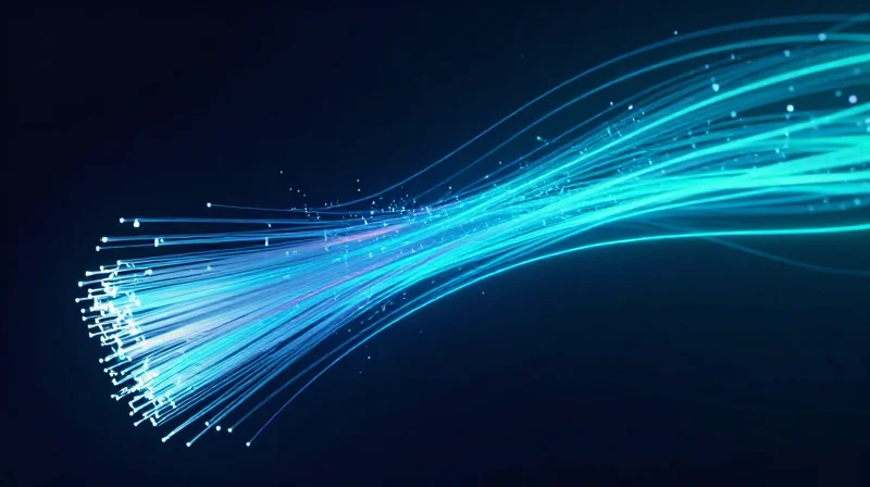 Abstract representation of high-speed data packets flowing through fiber optic lines.