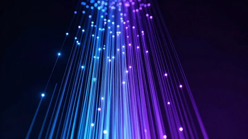 The State of ISP Network Infrastructure in 2026 Abstract visualization of high-speed 800G fiber optic data streams flowing in a futuristic tech environment.