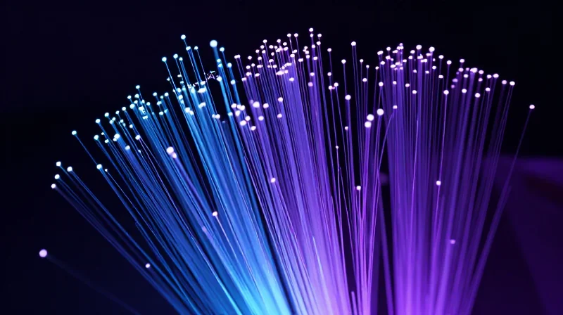 The Rise of 400G: Meeting Next-Generation Bandwidth Demands Abstract visualization of massive data flow and 400G network connections.