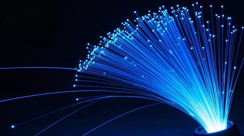 Abstract data flow through fiber optic cables representing network monitoring telemetry.