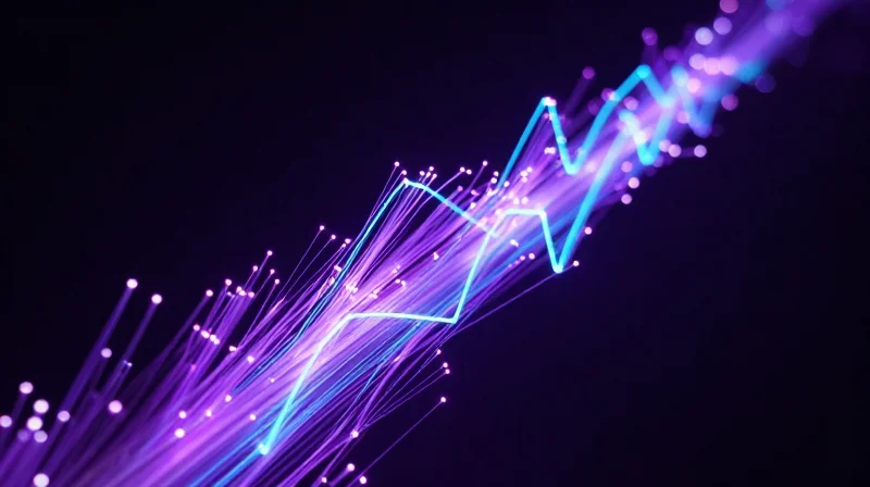 An abstract representation of 400G and 800G data speeds using high-speed light trails.
